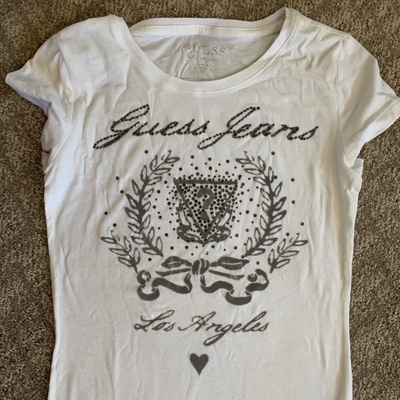 Guess Tops - Women’s white Guess tee never worn.